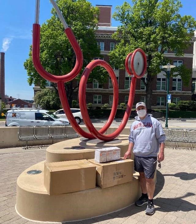 Dr. Ted Mikuls delivering masks to UNMC
