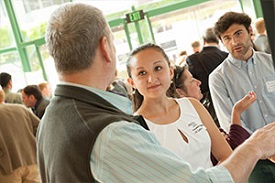 Three people talking.