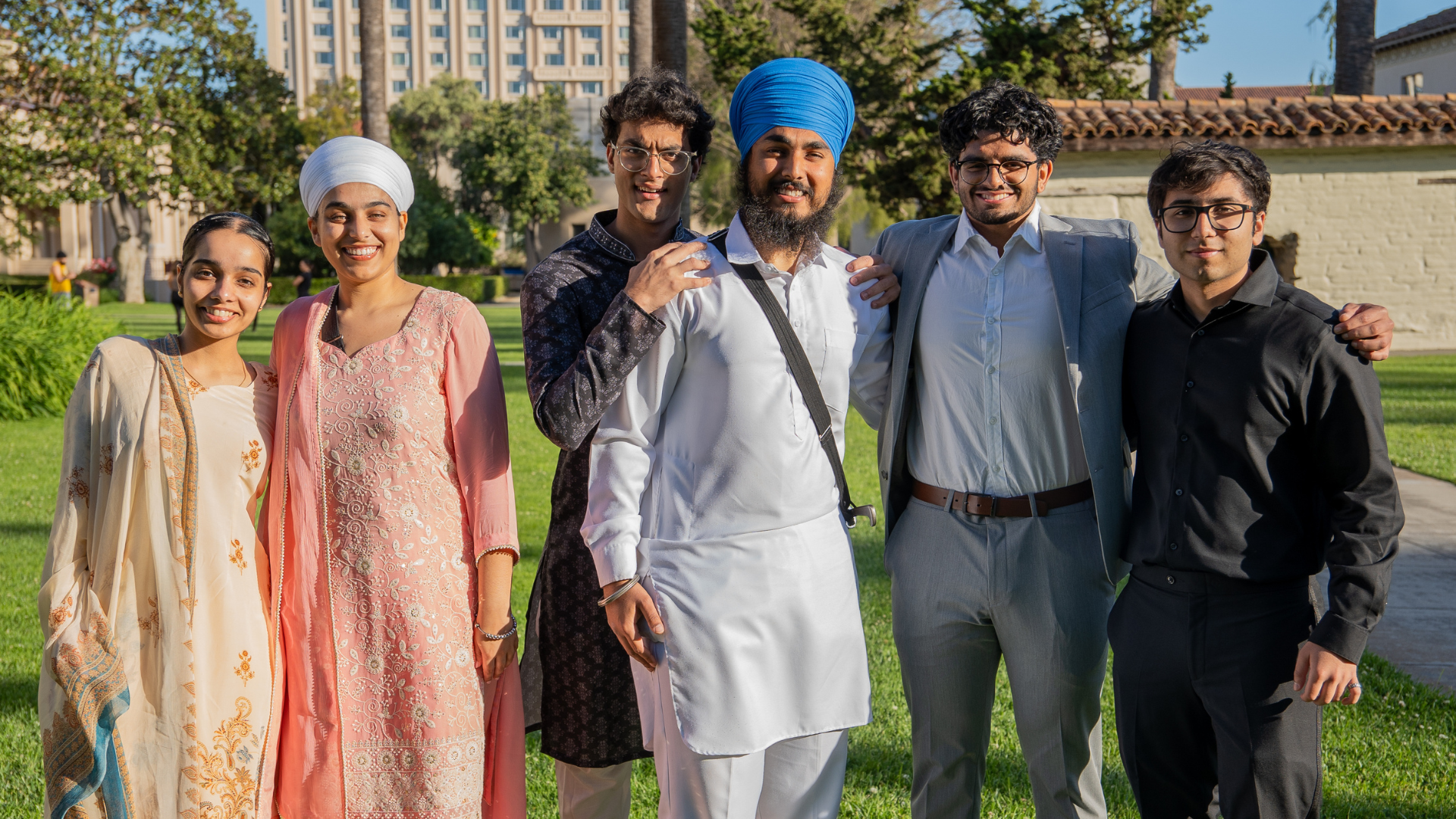 Sikh community gather together smiling