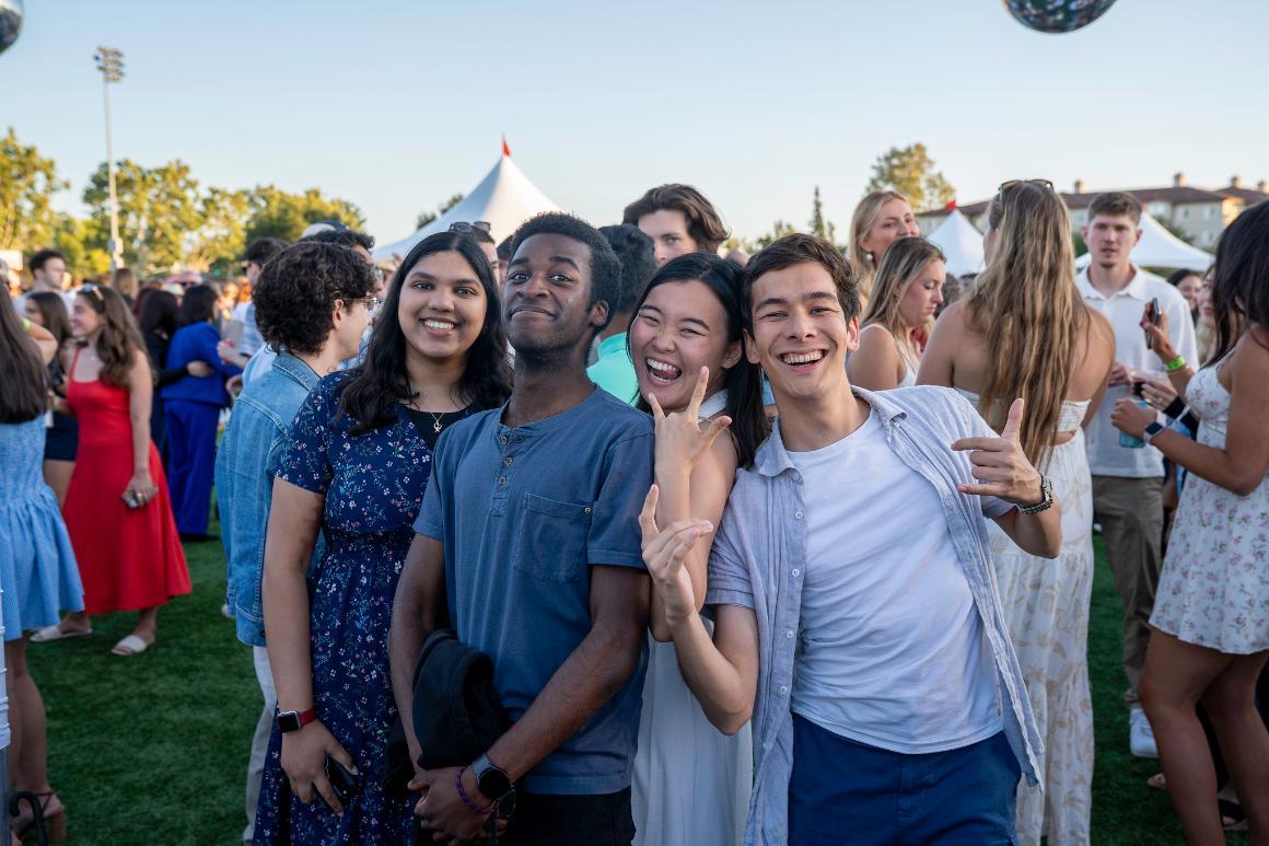 A group of friends smiling for the camera at Grad Bash 2025