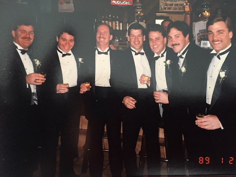 A group of people dressed in formal suits.