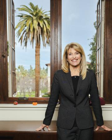 Woman in front of window