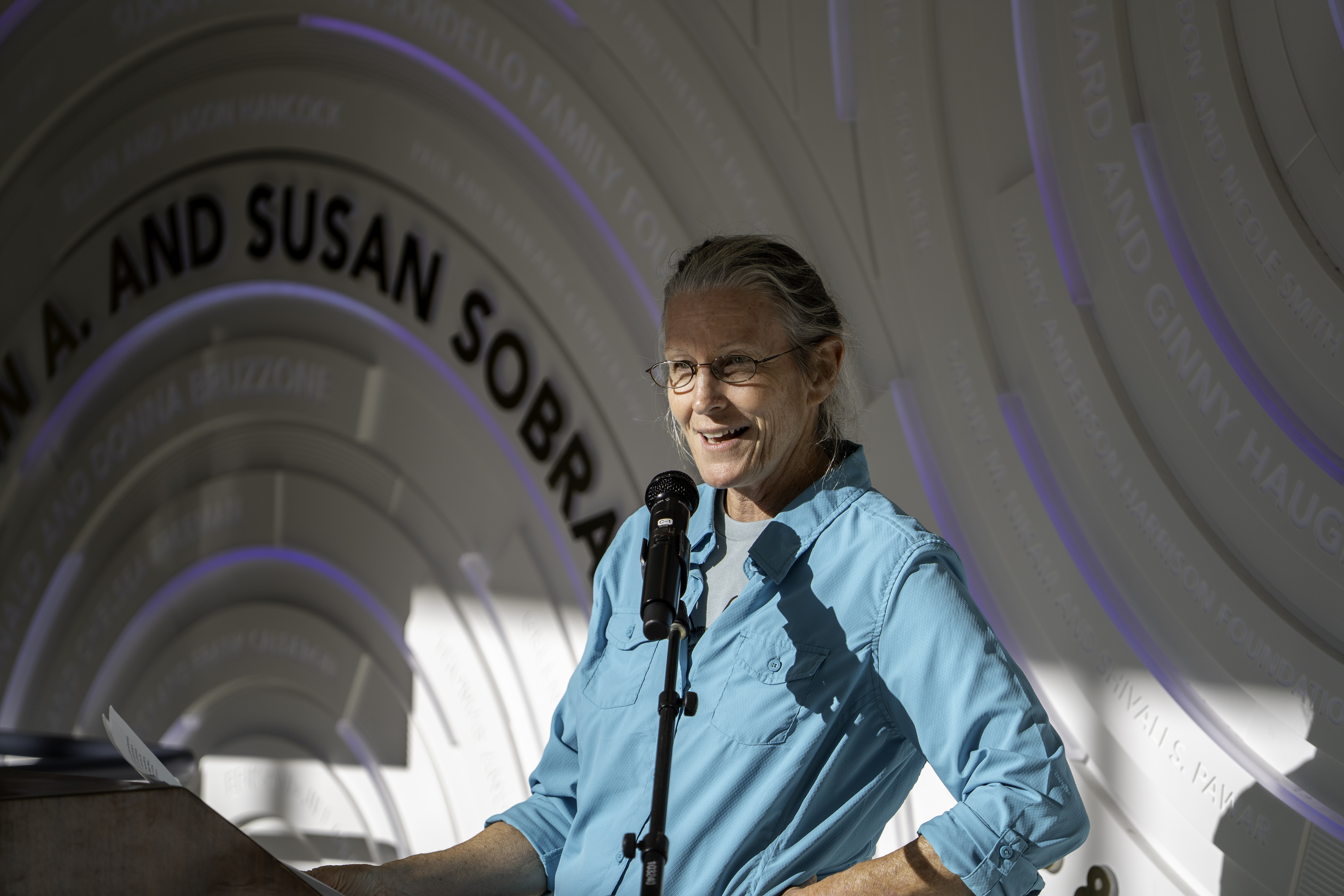 person speaking at podium