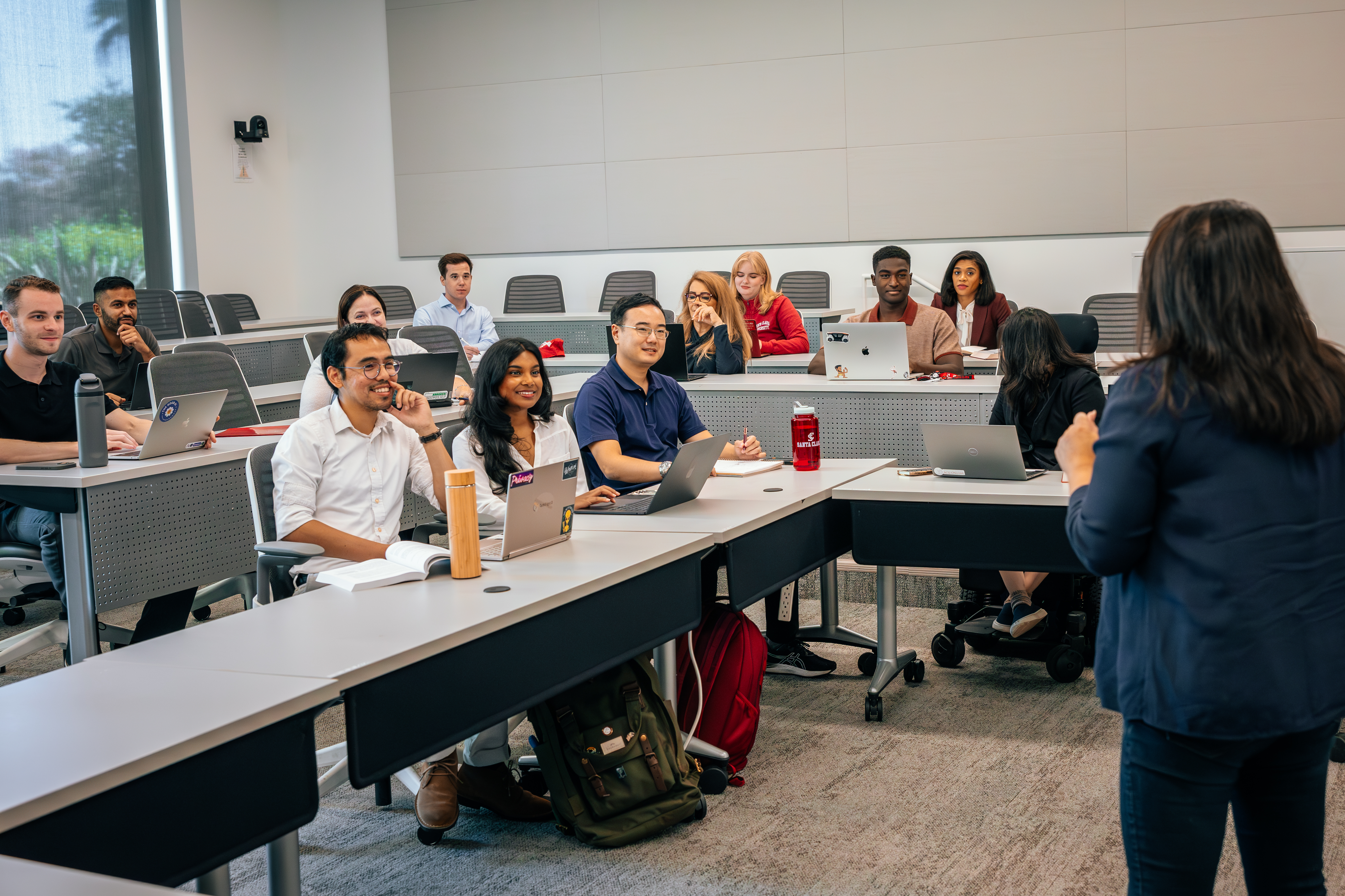 several students sitting at conference table 