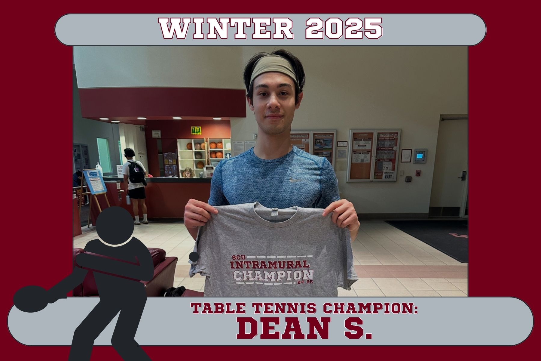 Photo of Dean S., posing in the Malley Center lobby with his IM Champion T-Shirt.