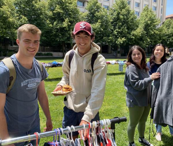 Students looking at clothes on campus