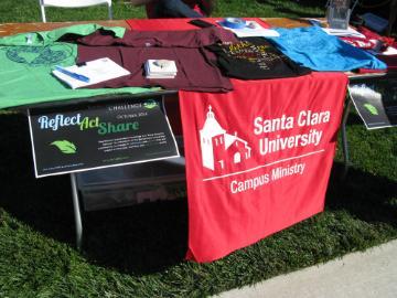 Table with Campus Ministry materials including a 