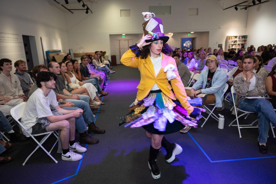 EcoFashion Show 2025: A model in a fanciful dress poses for the audience