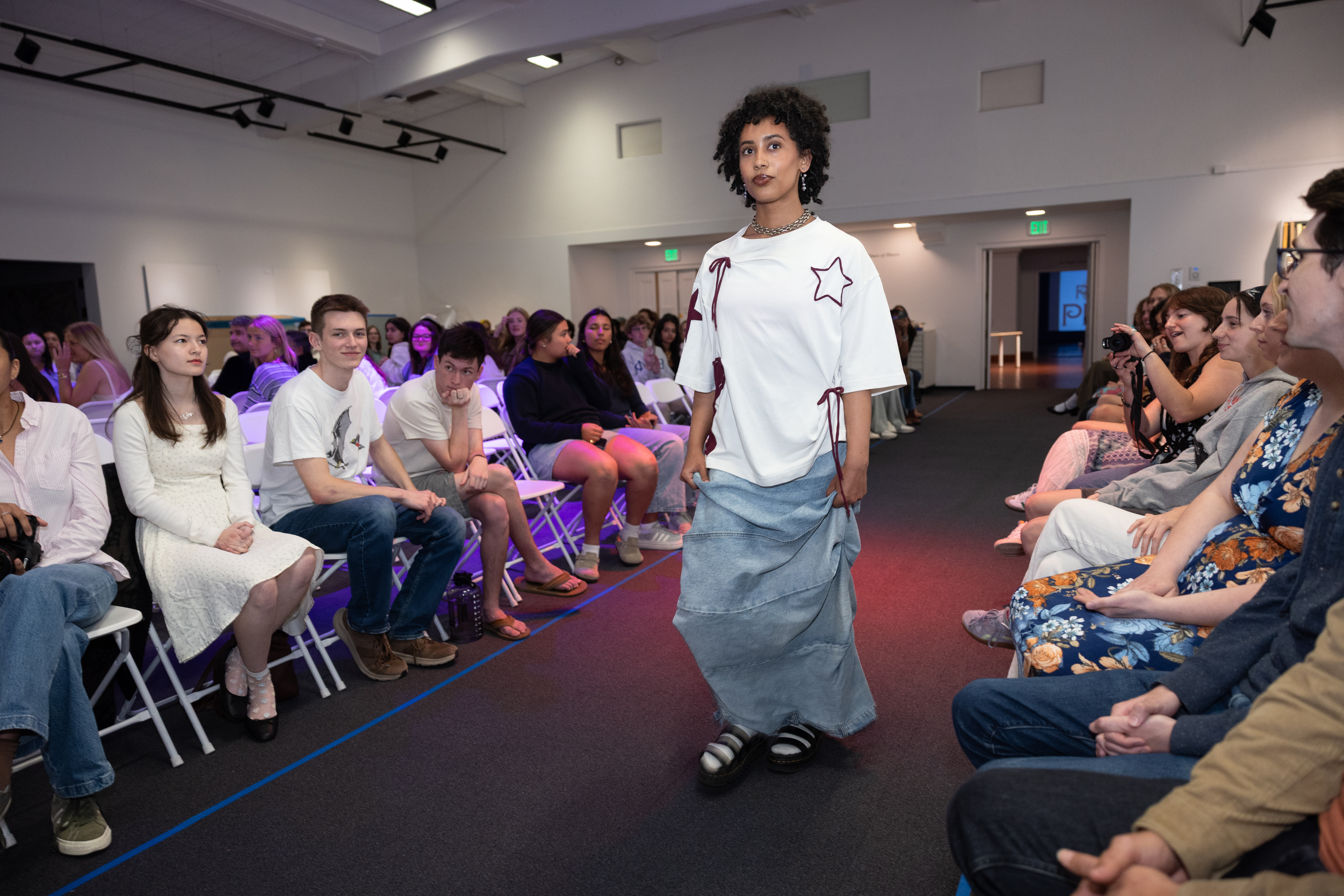 EcoFashion Show 2025: A model in a demin outfit walks the runaway