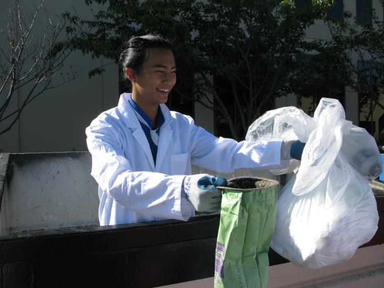 Alec Kwo at a waste characterization