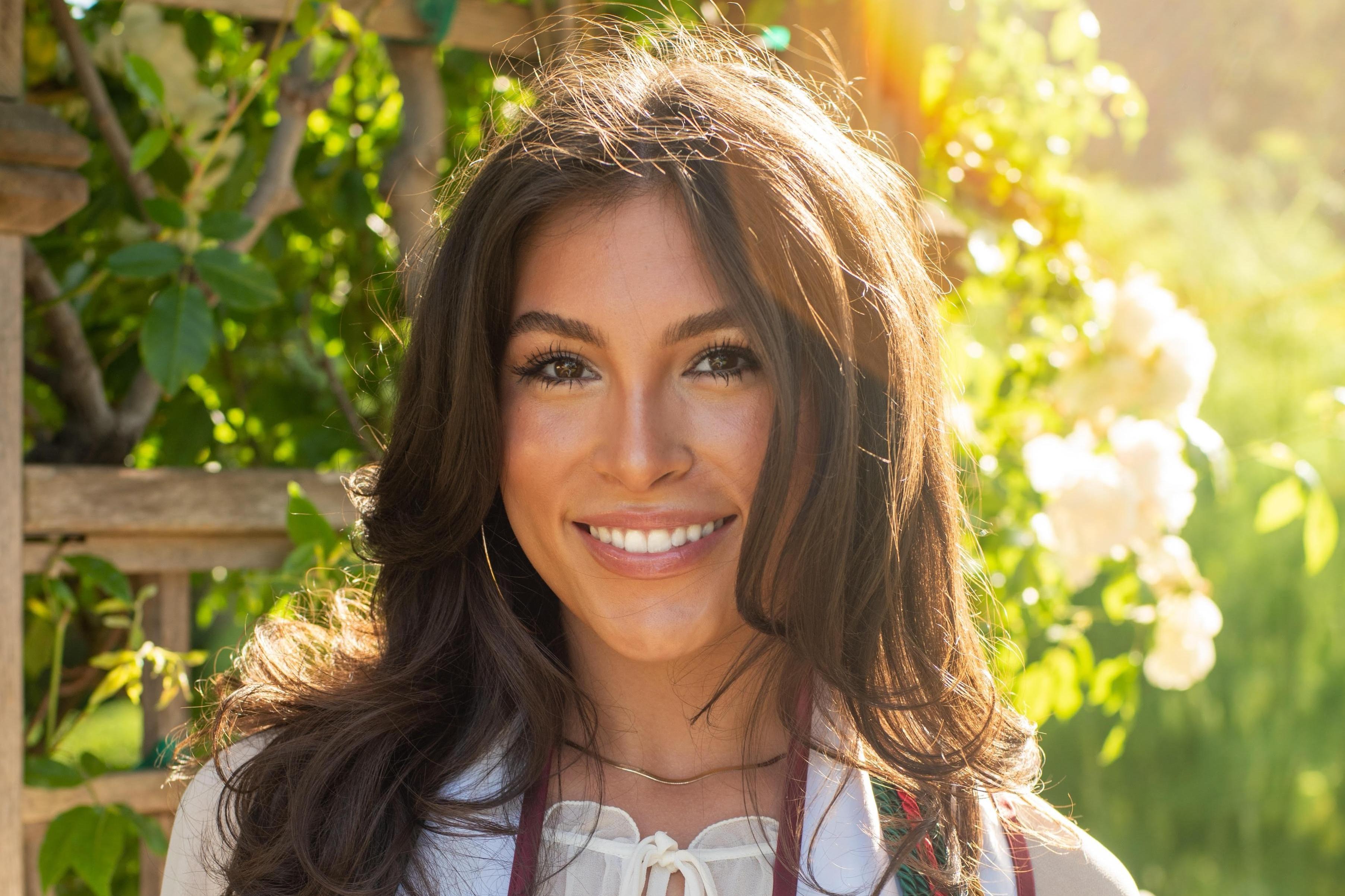 A photo of Ayla smiling. 