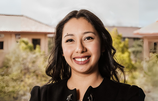 Headshot of a woman in black dress image link to story