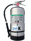 Metallic cylindrical K class fire extinguisher with attached hose and label.