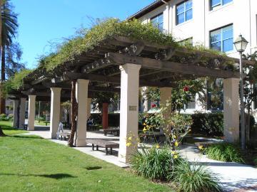 Trellis with greenery outside a building labeled 'Kenna Trellis'.