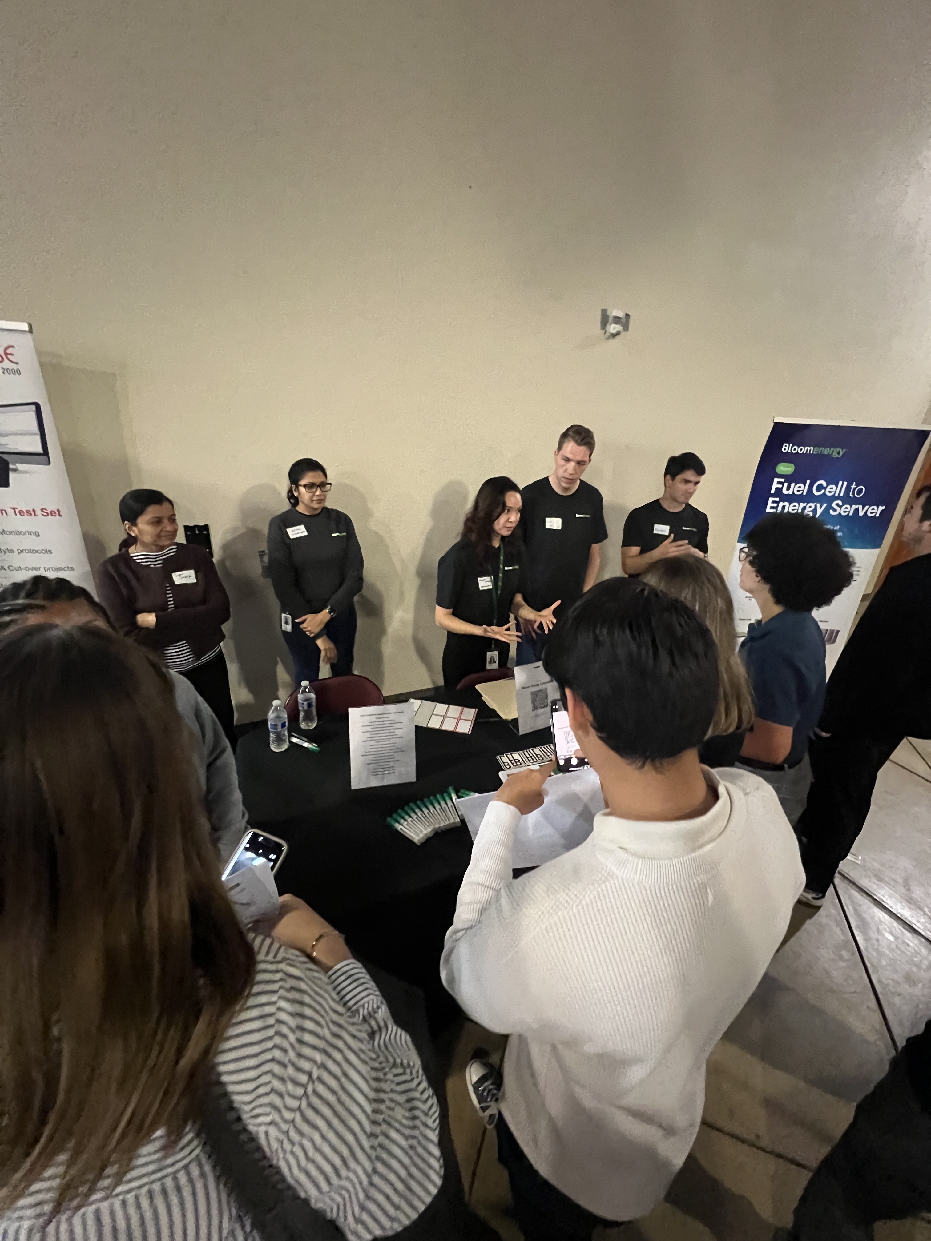 Students speak with representatives from BloomEnergy.