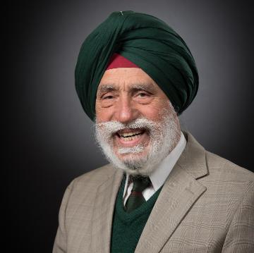 A headshot of Sukhmander Singh