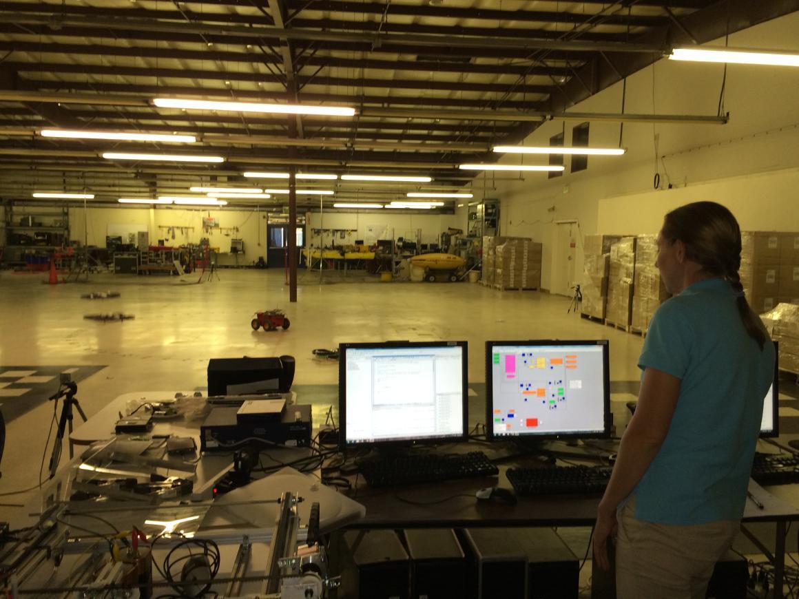 PhD student Jasmine Cashbaugh tests a drone's ability to track a UAV