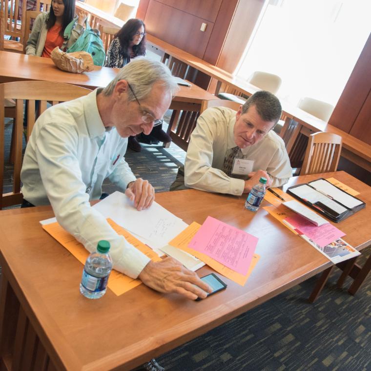 Engineering alumni serve as judges at the 2017 Senior Design Conference.