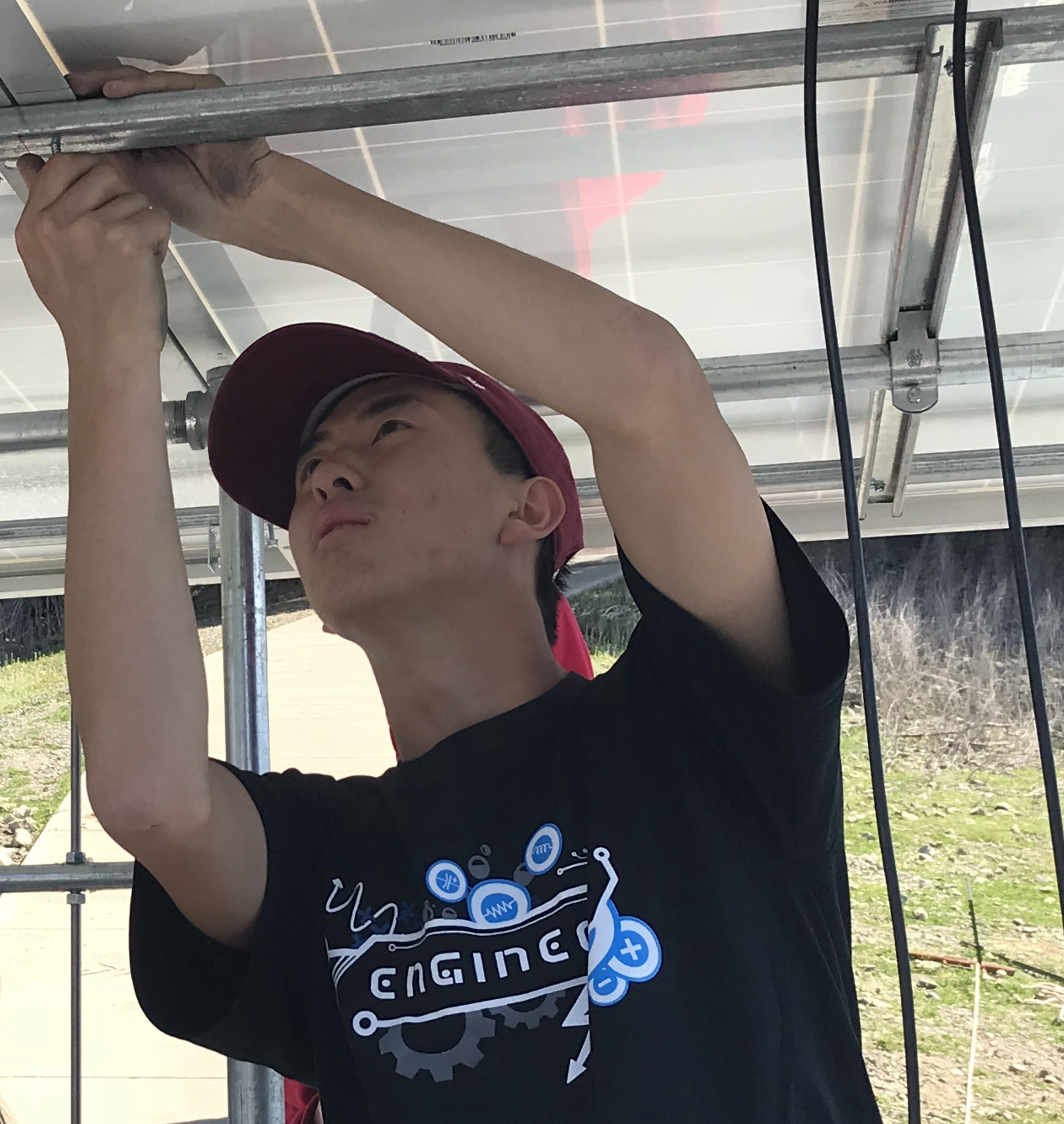 A person working with wiring under a ceiling. image link to story