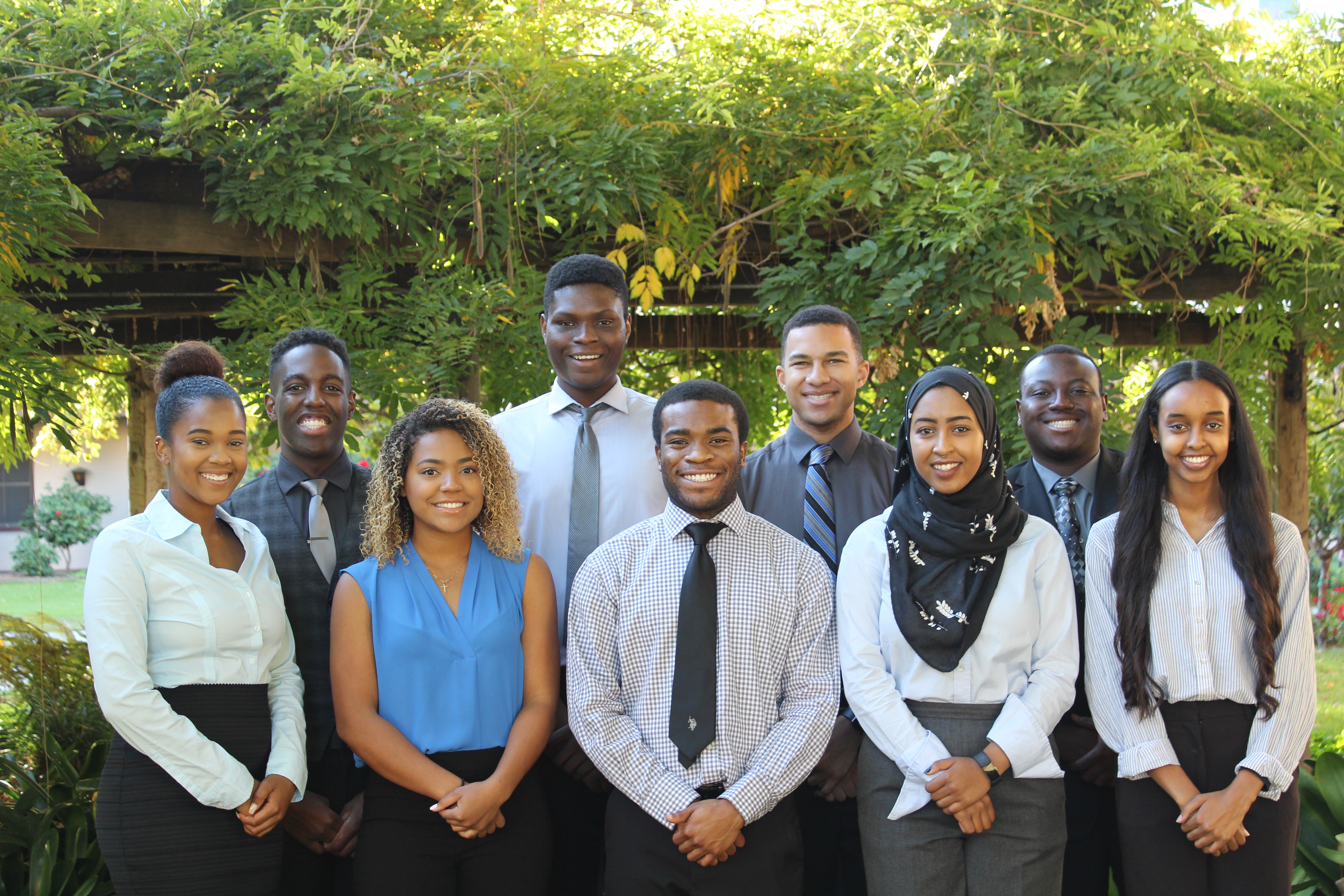 Group of people posing outdoors, titled 'NSBE 2017-2018 Executive Board'.