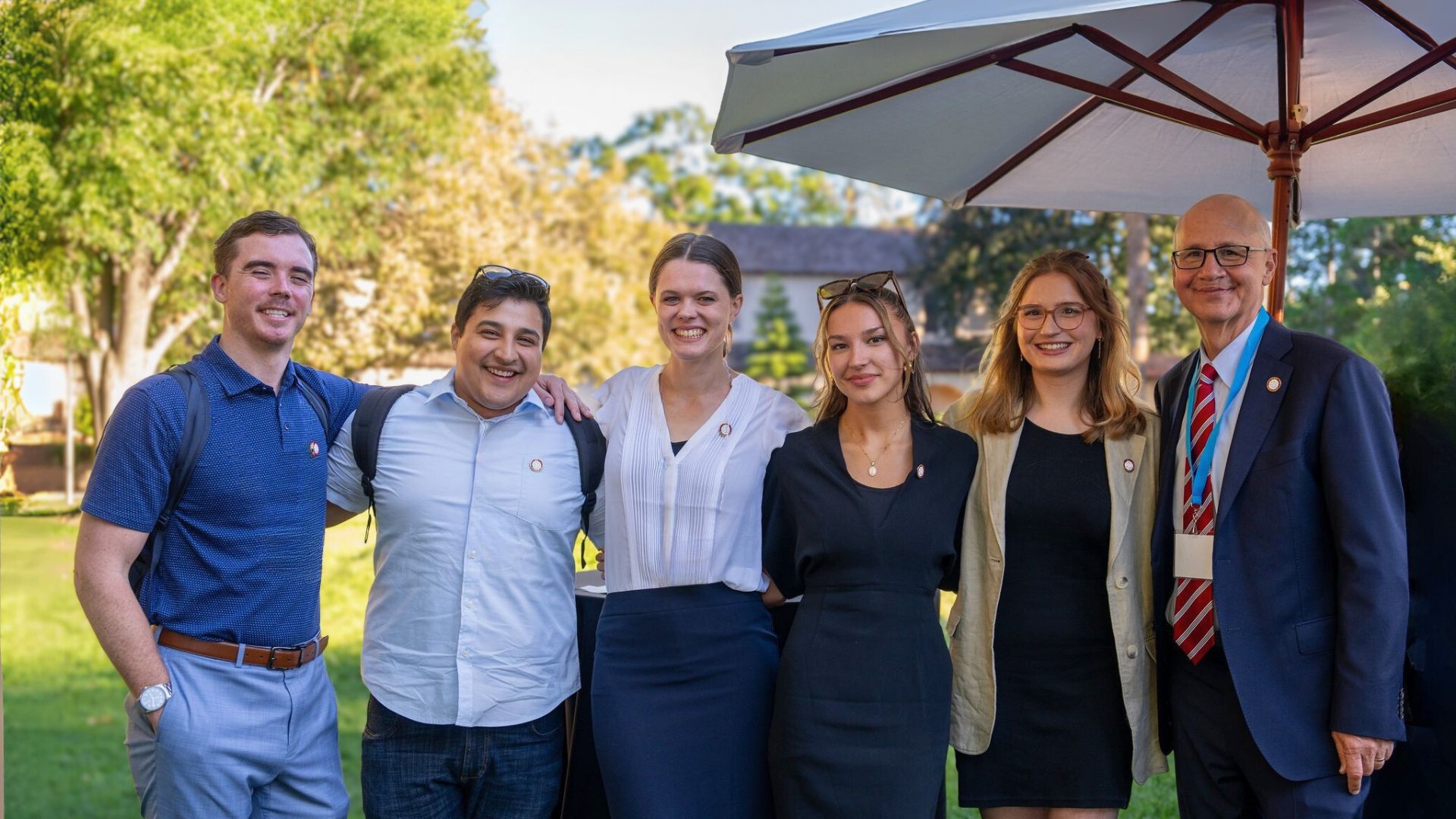 Law Students in Business Attire with Dean Kaufman
